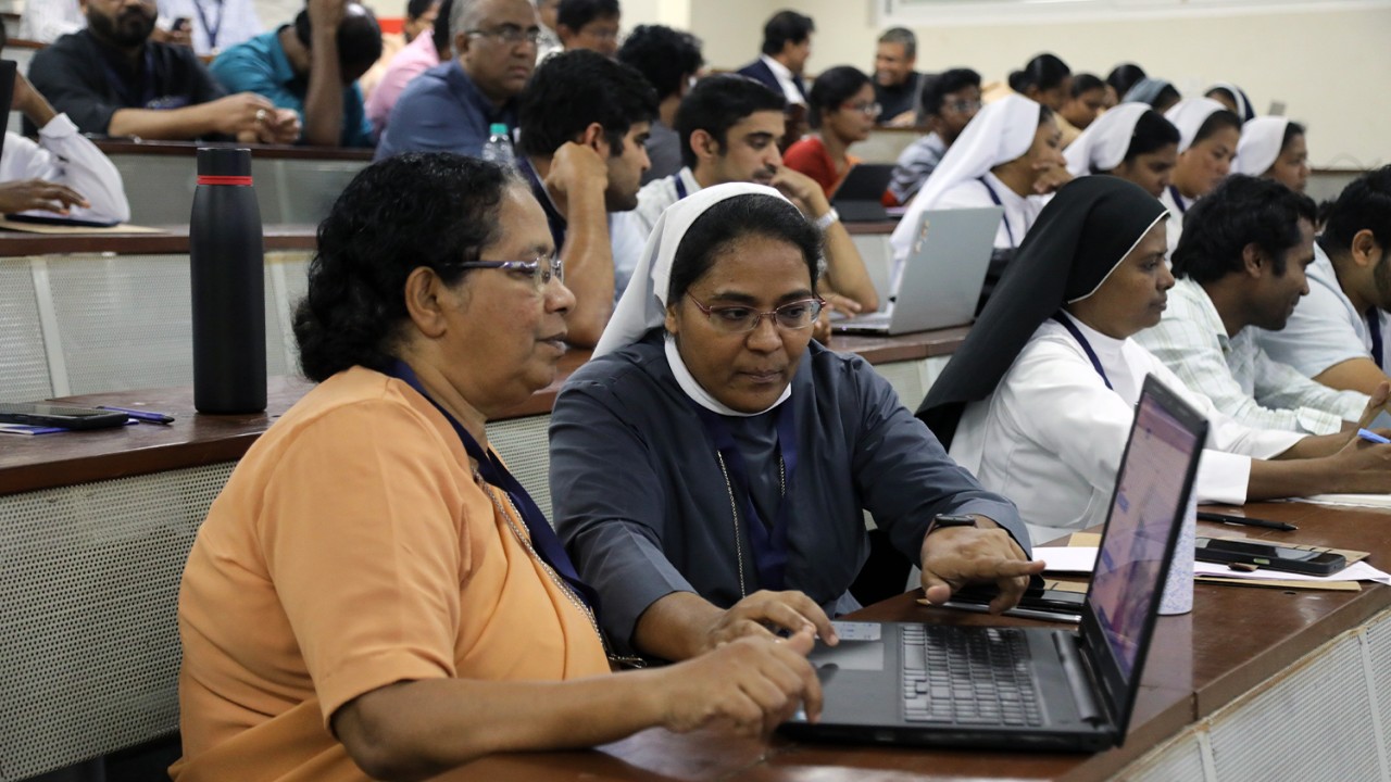The-religious-sisters-engaged-in-learning-the-AI-tools-in-the-workshopAEM.jpg